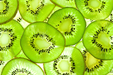 Image showing bright background of kiwi slices