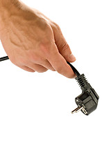 Image showing Hand with plug