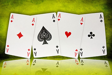 Image showing four aces  on green background