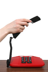 Image showing Telephone receiver in a  hand