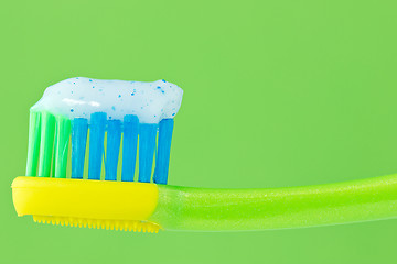 Image showing toothbrush on green background