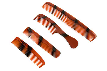 Image showing set of brown combs