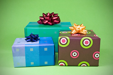 Image showing three colorful gifts 