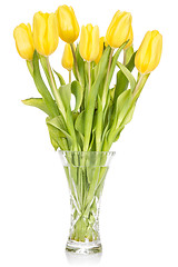 Image showing Crystal vase with yellow tulips