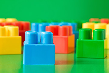 Image showing colorful  blocks on green background