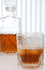 Image showing wet glass of whiskey