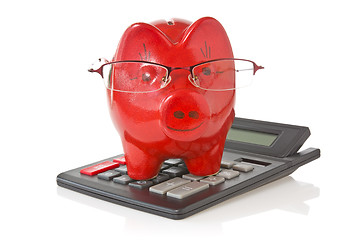 Image showing calculator and piggy-bank 