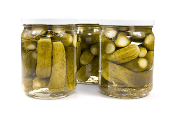 Image showing glass jars with preserved cucumbers