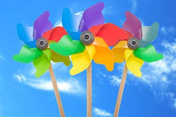 Image showing  pinwheel toys against blue sky