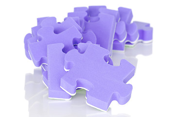 Image showing pile of purple puzzle