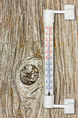 Image showing thermometer on the wooden wall