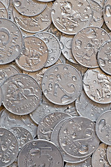 Image showing wet silver coins