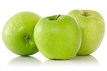 Image showing three green apples with reflection