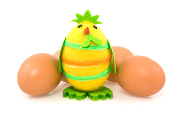 Image showing funny easter chick and brown eggs