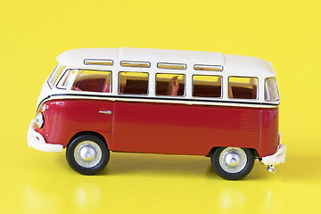 Image showing red bus isolated on yellow background