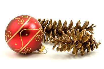 Image showing christmas bauble and pine cones