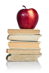 Image showing  Stack of books with apple 