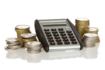 Image showing calculator and stack of coins 