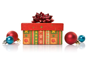 Image showing  gift box and christmas baubles