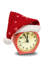 Image showing alarm clock in the hat of Santa