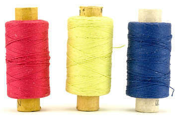 Image showing three thread spools