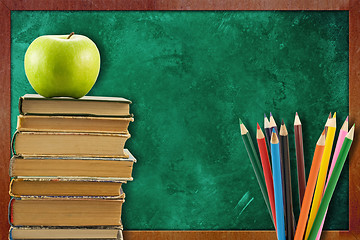 Image showing books with apple and pencils