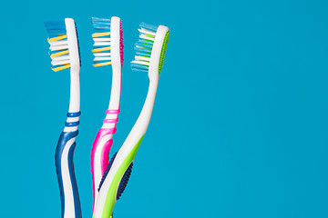 Image showing Three toothbrushes