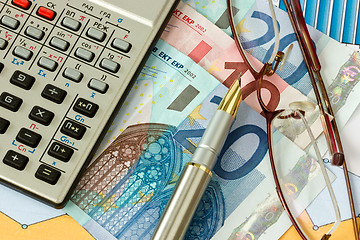 Image showing European money, pen, calculator and glasses