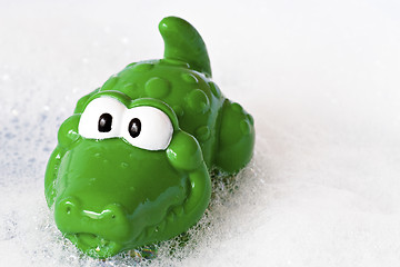 Image showing funny crocodile in a bath foam