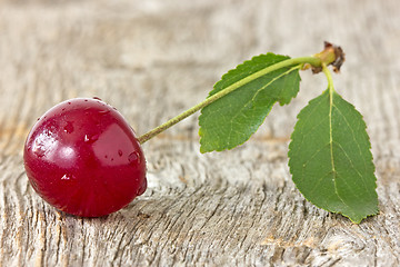 Image showing cherry with leaf 