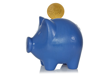 Image showing Blue piggy bank with fifty eurocents