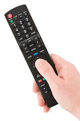 Image showing hand with TV remote control