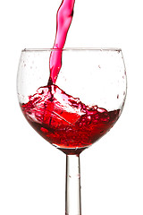 Image showing red wine pouring into glass