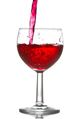 Image showing red wine pouring