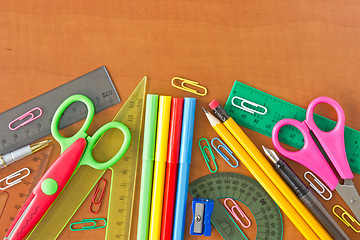 Image showing  school supplies on the wooden table