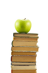 Image showing books and green apple