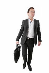 Image showing Portrait of a business man carrying a suitcase on white backgrou