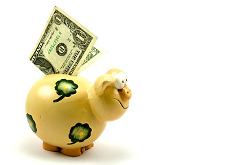 Image showing piggy bank with one dollar