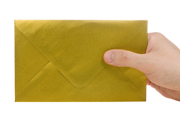 Image showing hand with gold envelope