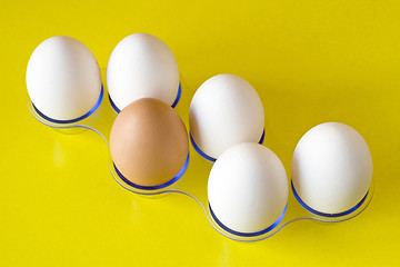 Image showing six eggs on yellow background