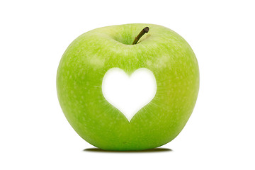 Image showing apple with a bright heart shape 