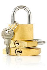 Image showing three golden padlocks