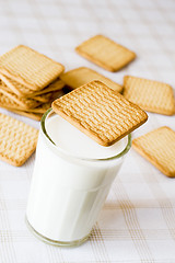 Image showing glass of milk with cookies