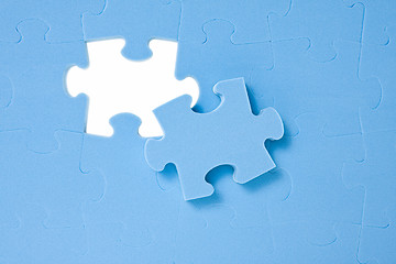 Image showing One last puzzle piece 