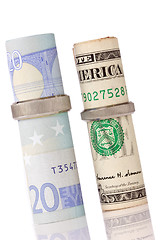Image showing euros and dollar in a wedding rings