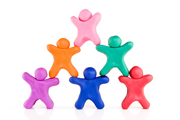 Image showing  plasticine guys making a human pyramid 