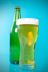 Image showing beer over a blue background