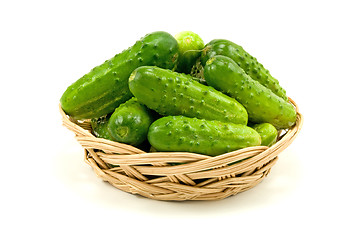 Image showing wicker dish with cucumbers