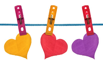 Image showing color paper hearts hung on clothesline