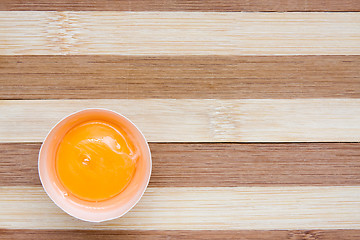 Image showing egg on a wooden background